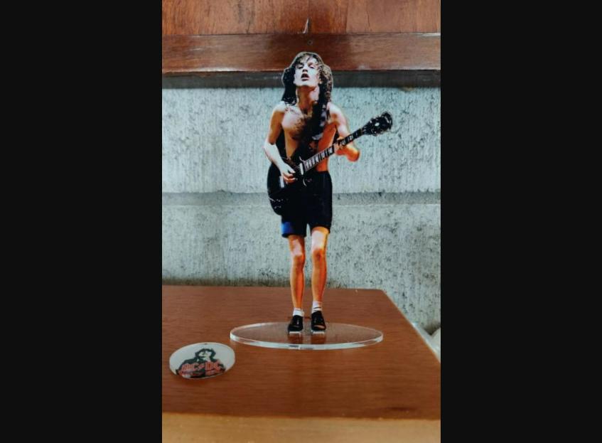 Angus Young AC-DC standing figure cristal clear acrylic. He looks so real!
