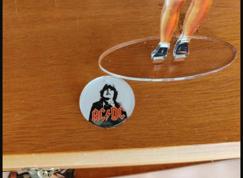 Angus Young AC-DC standing figure cristal clear acrylic. He looks so real!