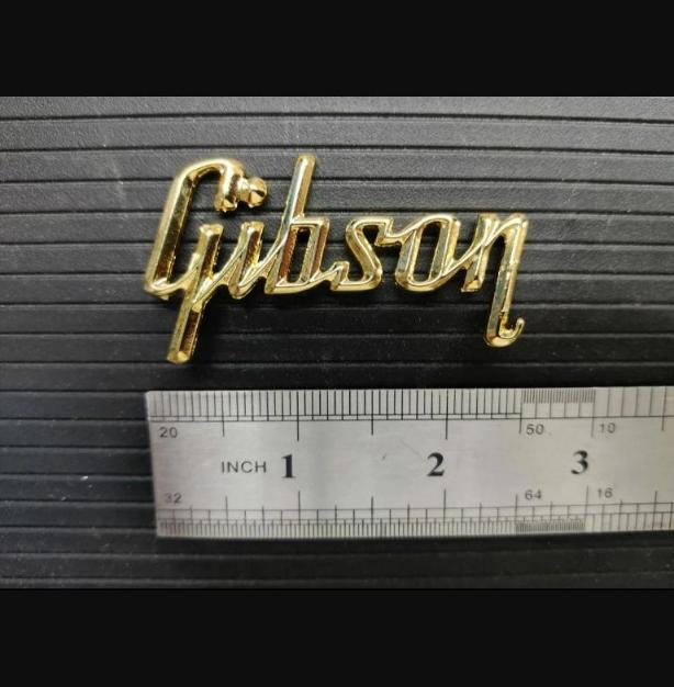 Flying V Headstock Guitar 3D Raised Logo Metallic Real Gold NO USA CUSTOMS FEES.