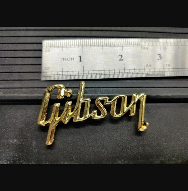 Flying V Headstock Guitar 3D Raised Logo Metallic Real Gold NO USA CUSTOMS FEES.