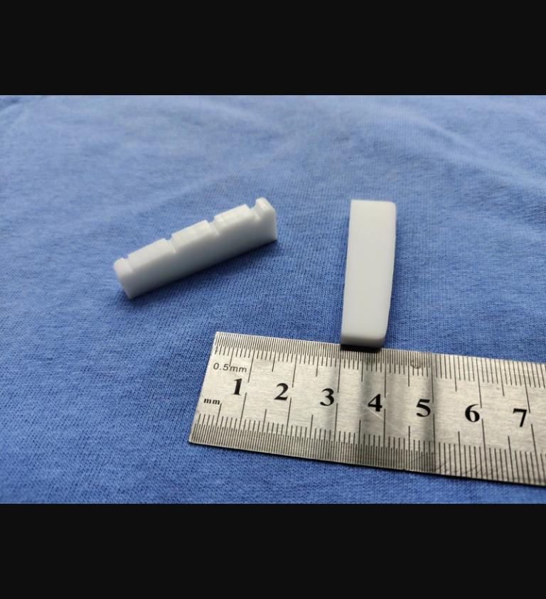 Pair of 3/16 white nuts for Rickenbacker 4001 4003 bass. Standard size nut.