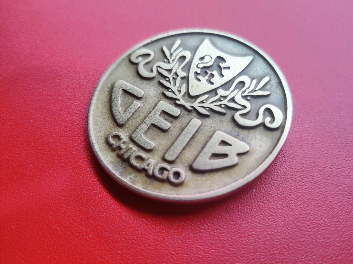 GEIB Chicago plate logo badge for guitar or mandolin case.