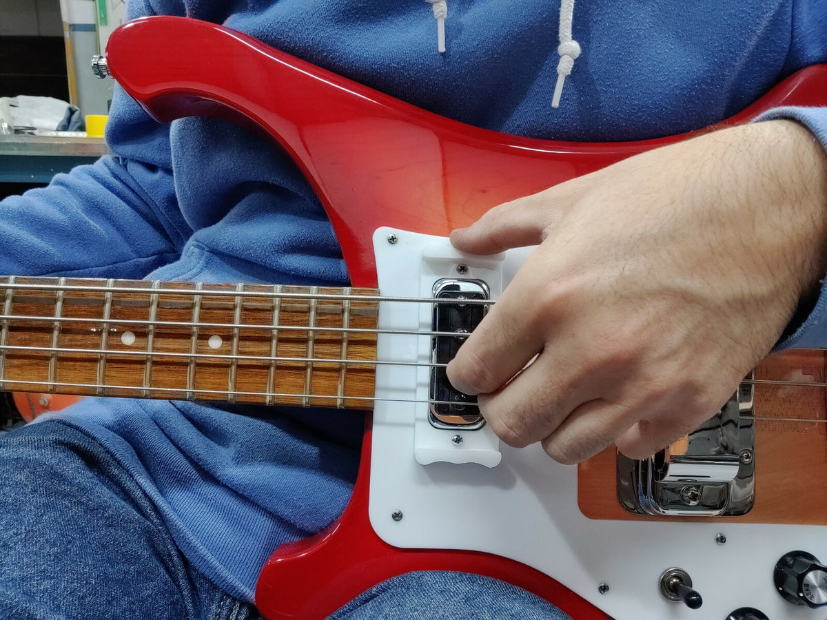 2 position white thumbrest for Rickenbacker 4001, 4003 all bass Models. No mods.